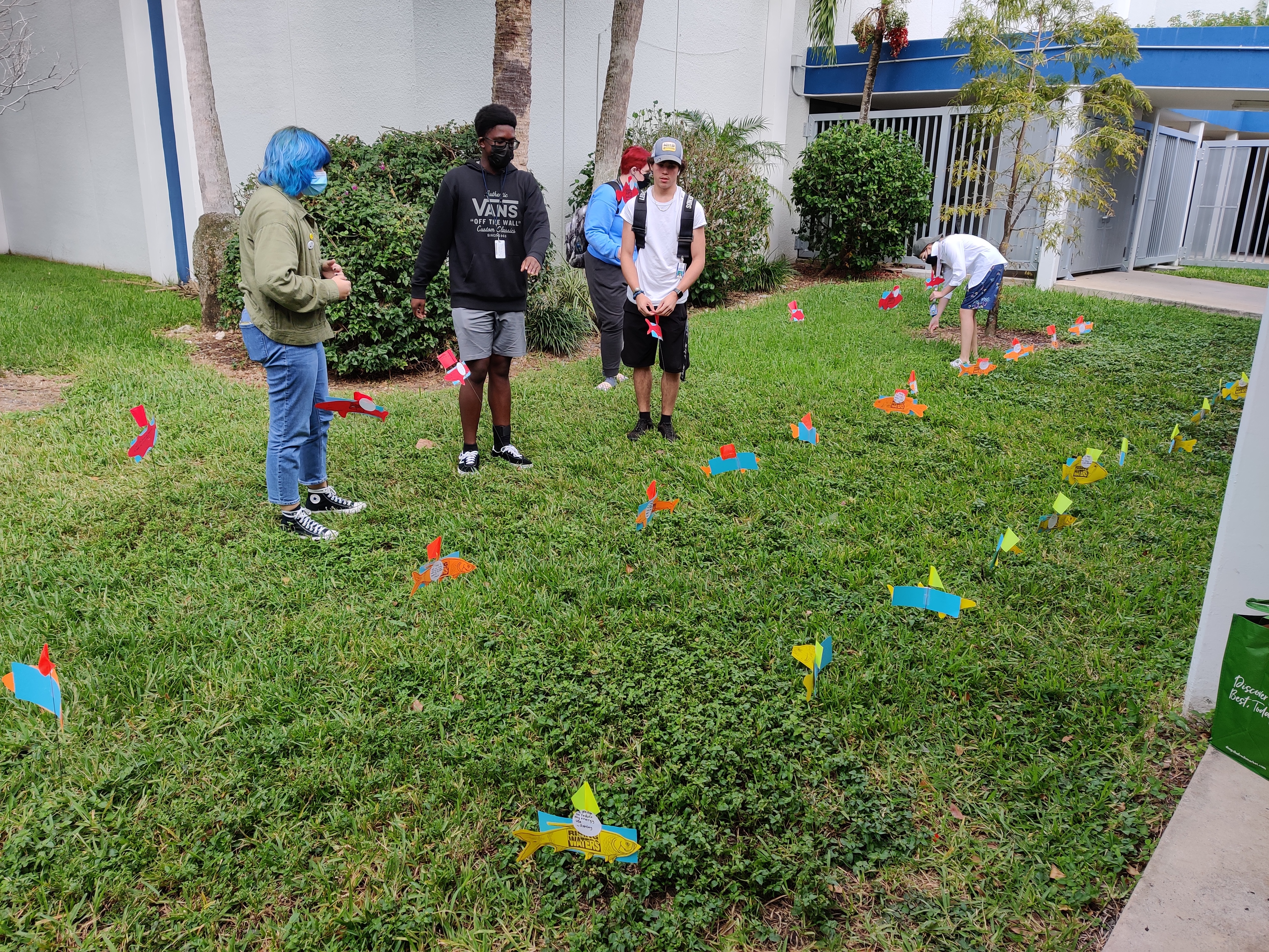 Students installing their action fish